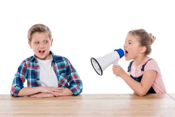 Sister yelling at brother. 