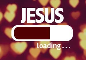 Computer screen loading "Jesus" - an allusion to online church, online worship. 