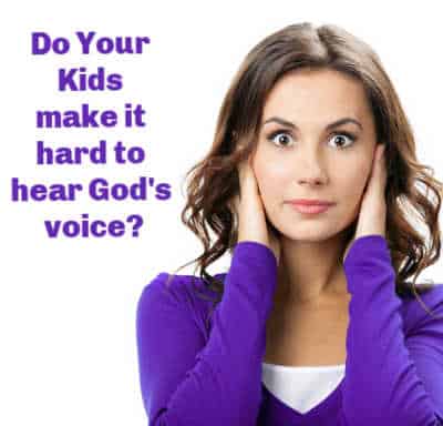 Do Your Kids make it hard to hear God's voice? Mom covering her ears because it is hard to have a quiet time with God when you have loud kids.