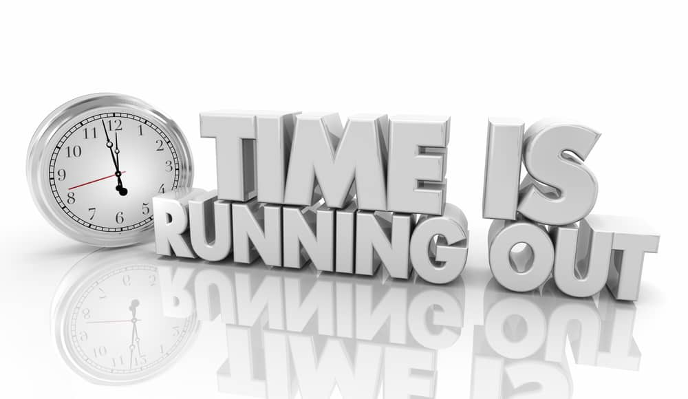 Teach kids Good stewardship of time - A silver clock and silver block letters that say time is running out. 