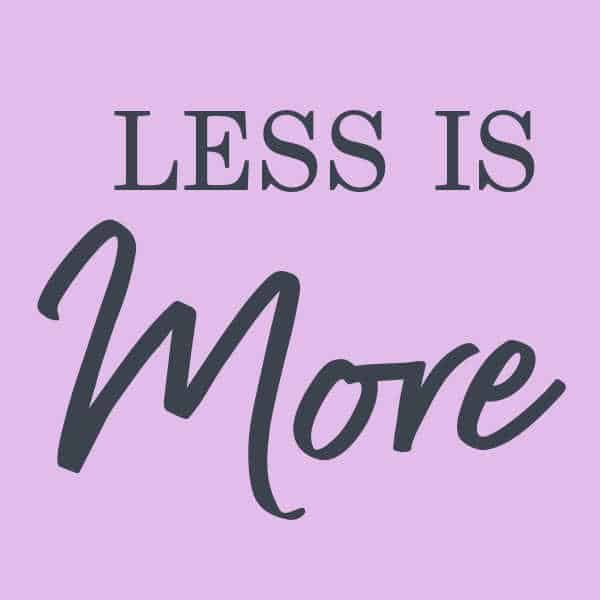 Purple square with the words less is more, a reminder for mom's to simplify your family life. 